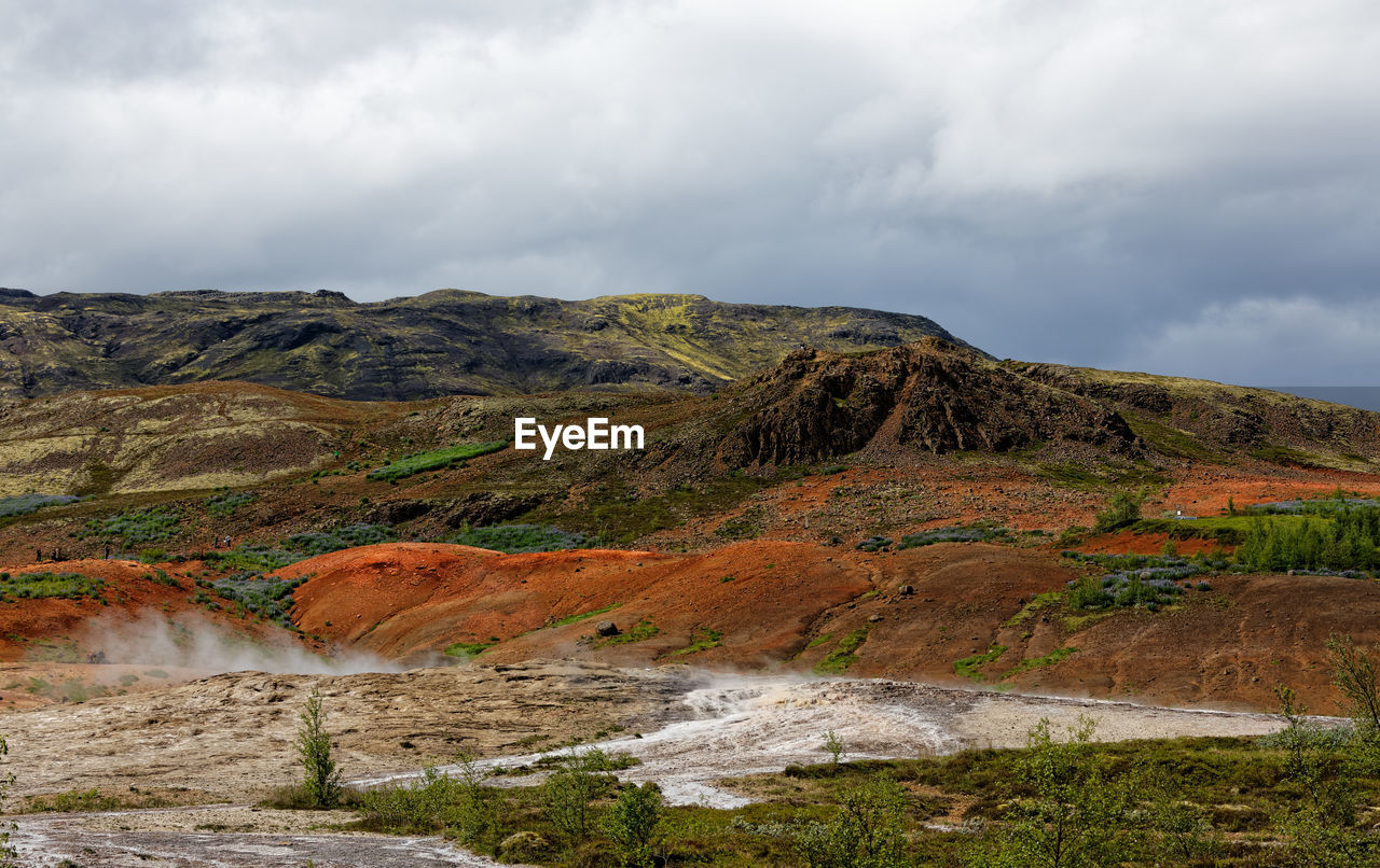 Scenic view of land against sky