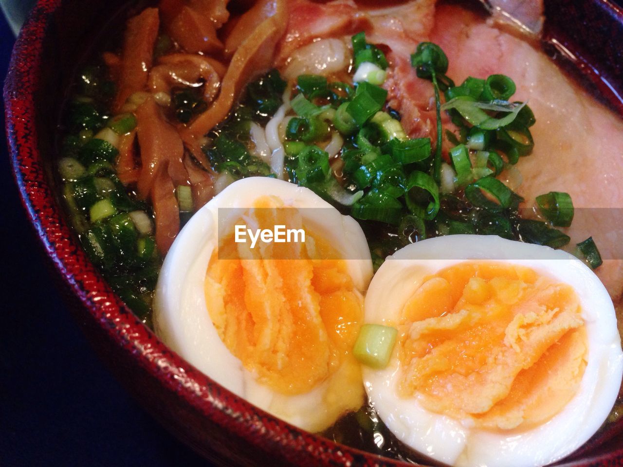 Close-up of chinese food in container on table