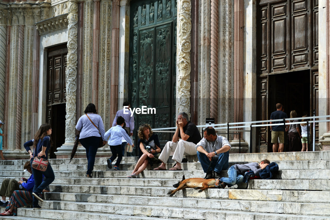 People at historic building