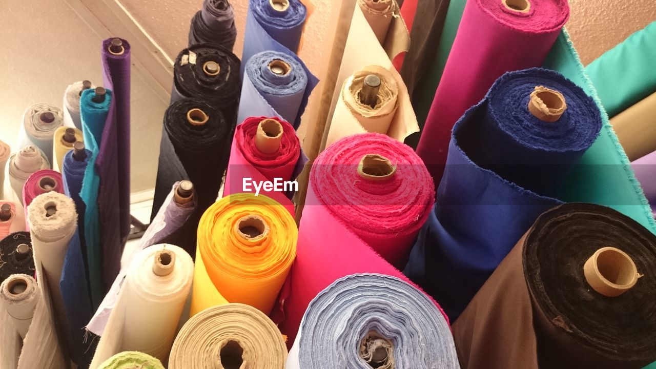 High angle view of colorful fabrics for sale in store