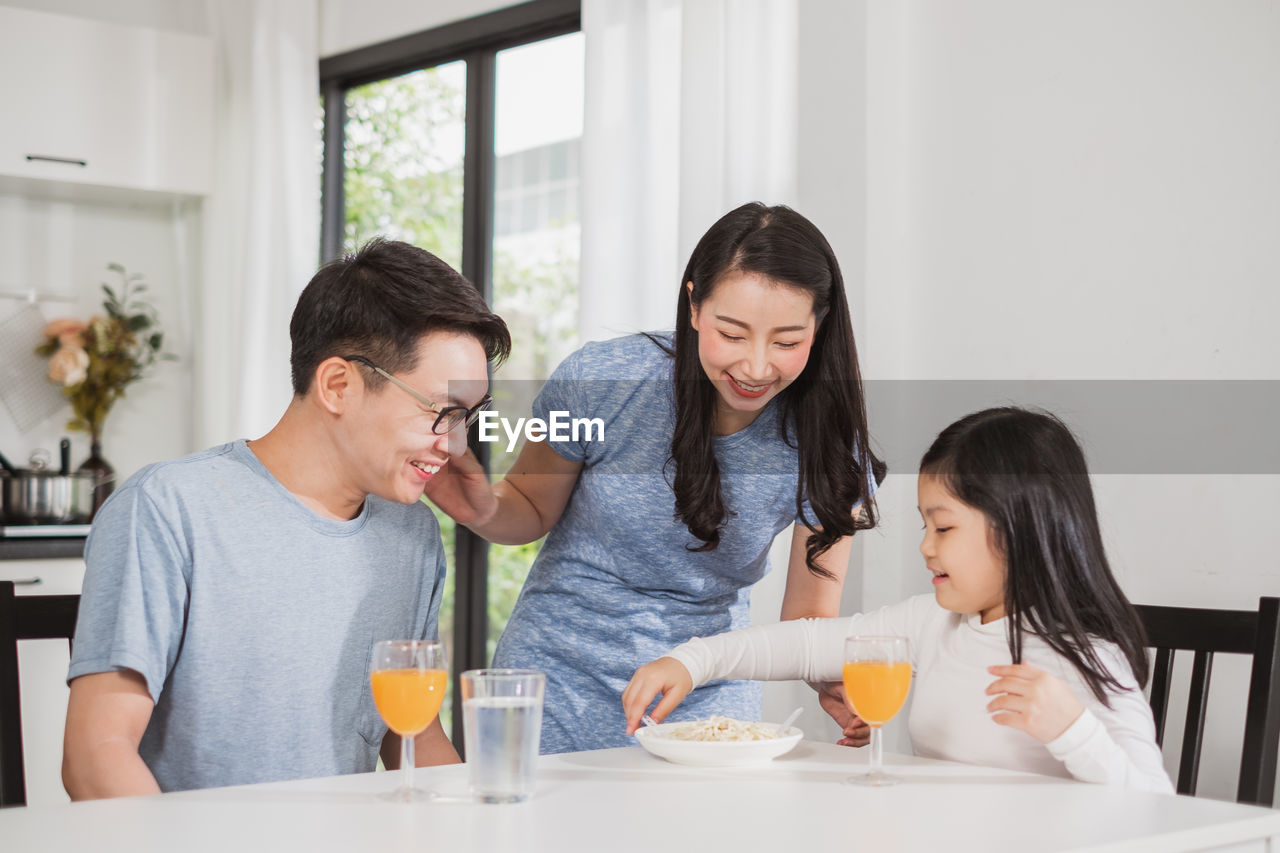 Family having breakfast at home