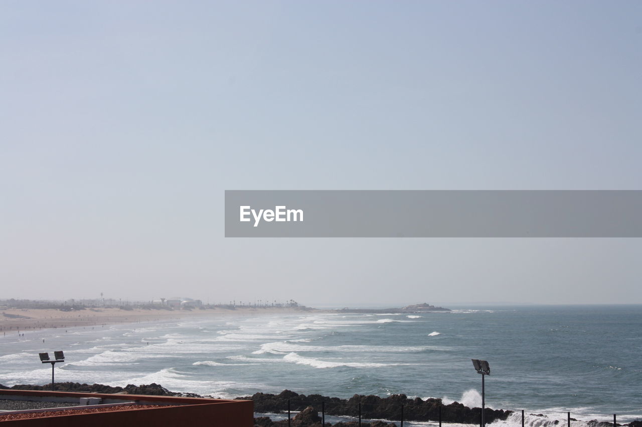 Scenic view of sea against clear sky