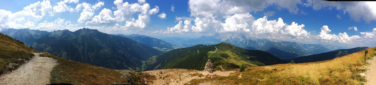 PANORAMIC VIEW OF MOUNTAIN RANGE AGAINST SKY