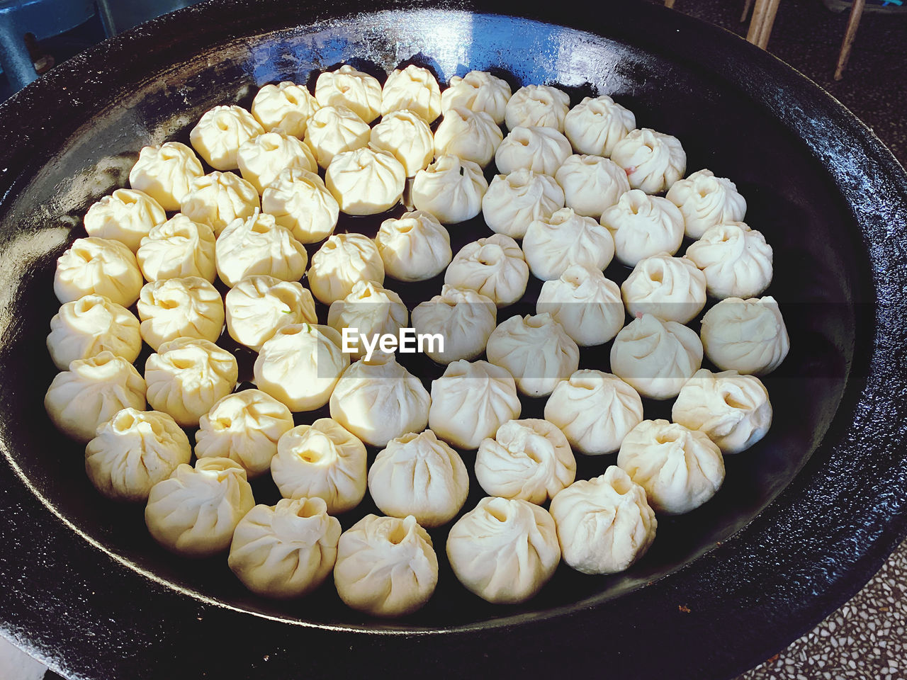 food, food and drink, freshness, dish, cuisine, no people, dumpling, chinese food, indoors, chinese dumpling, healthy eating, still life, produce, high angle view, dessert, wellbeing, large group of objects, snack, close-up, household equipment, street food, asian food, preparing food, fried