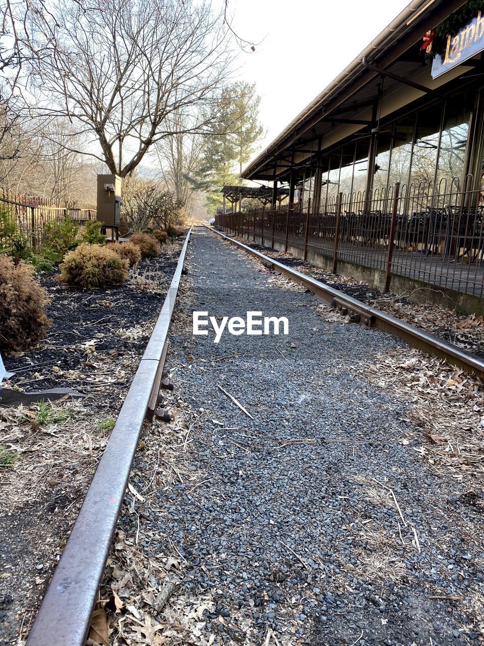 SURFACE LEVEL OF RAILROAD TRACK BY BUILDING