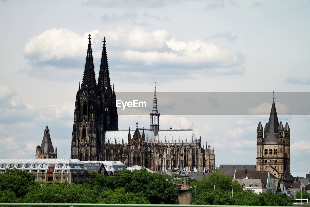 VIEW OF BELL TOWER IN CITY