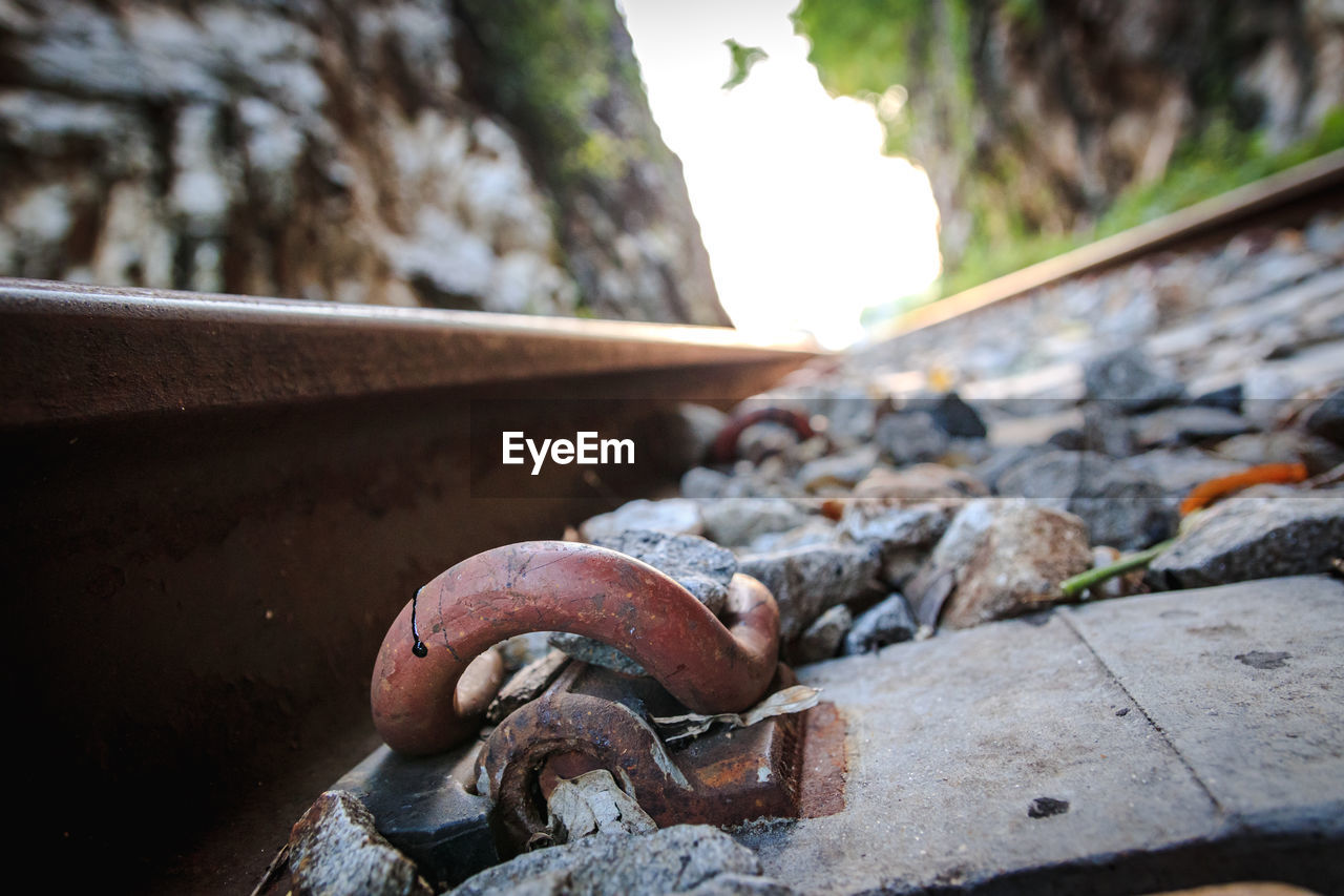 CLOSE-UP OF RUSTY RAILROAD TRACKS