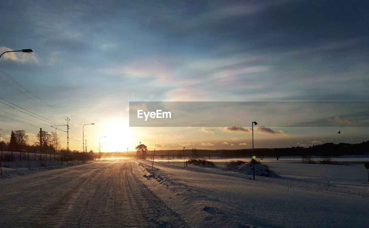 Road against sky during winter