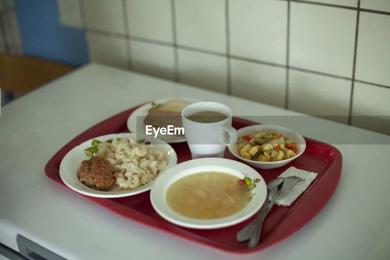 Food in the dining room. lunch on a tray. regular school meals. meals for schoolchildren in russia. 