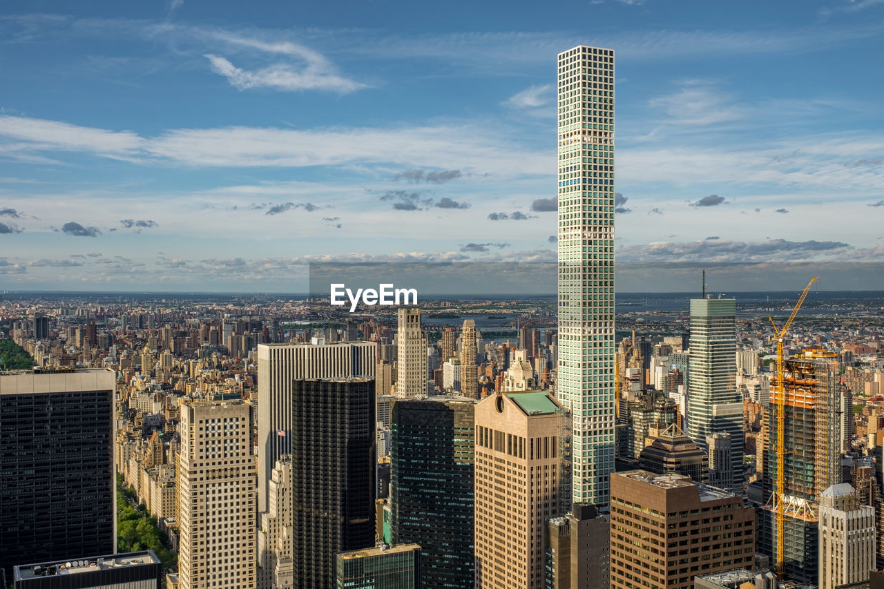 MODERN BUILDINGS AGAINST SKY