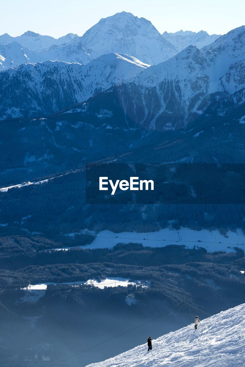 Aerial view of snowcapped mountains 