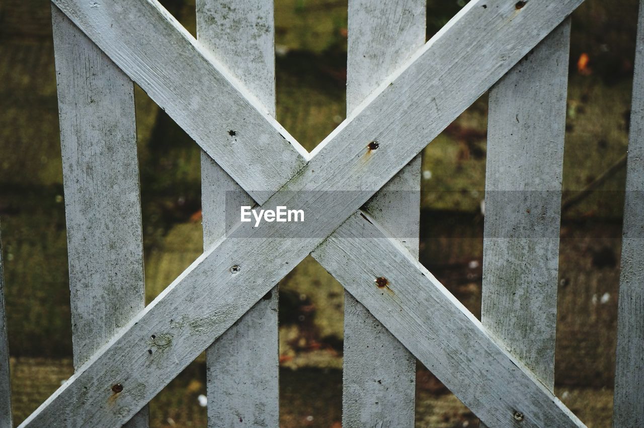 Close-up of cross shape wooden fence