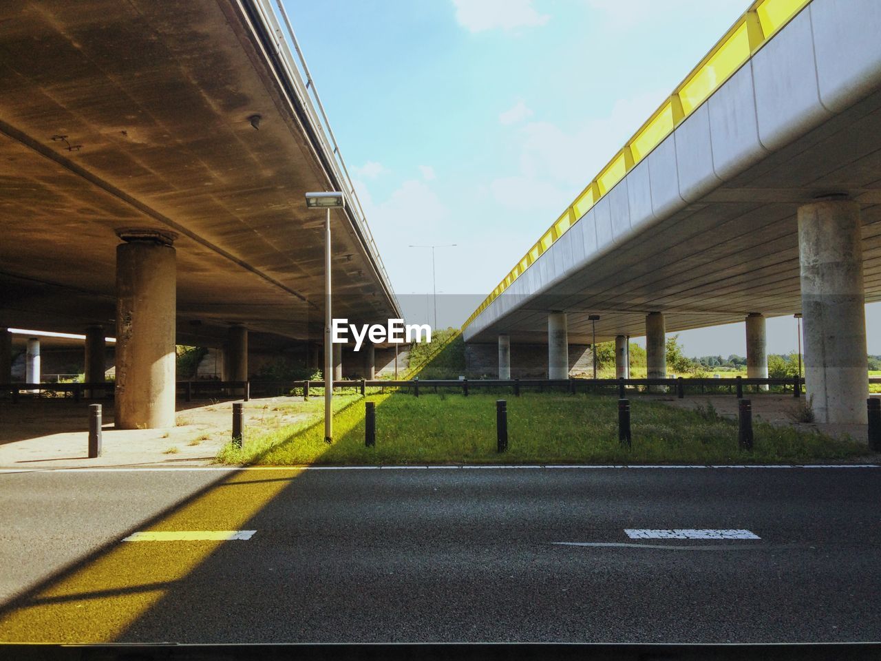 Bridges over road against sky