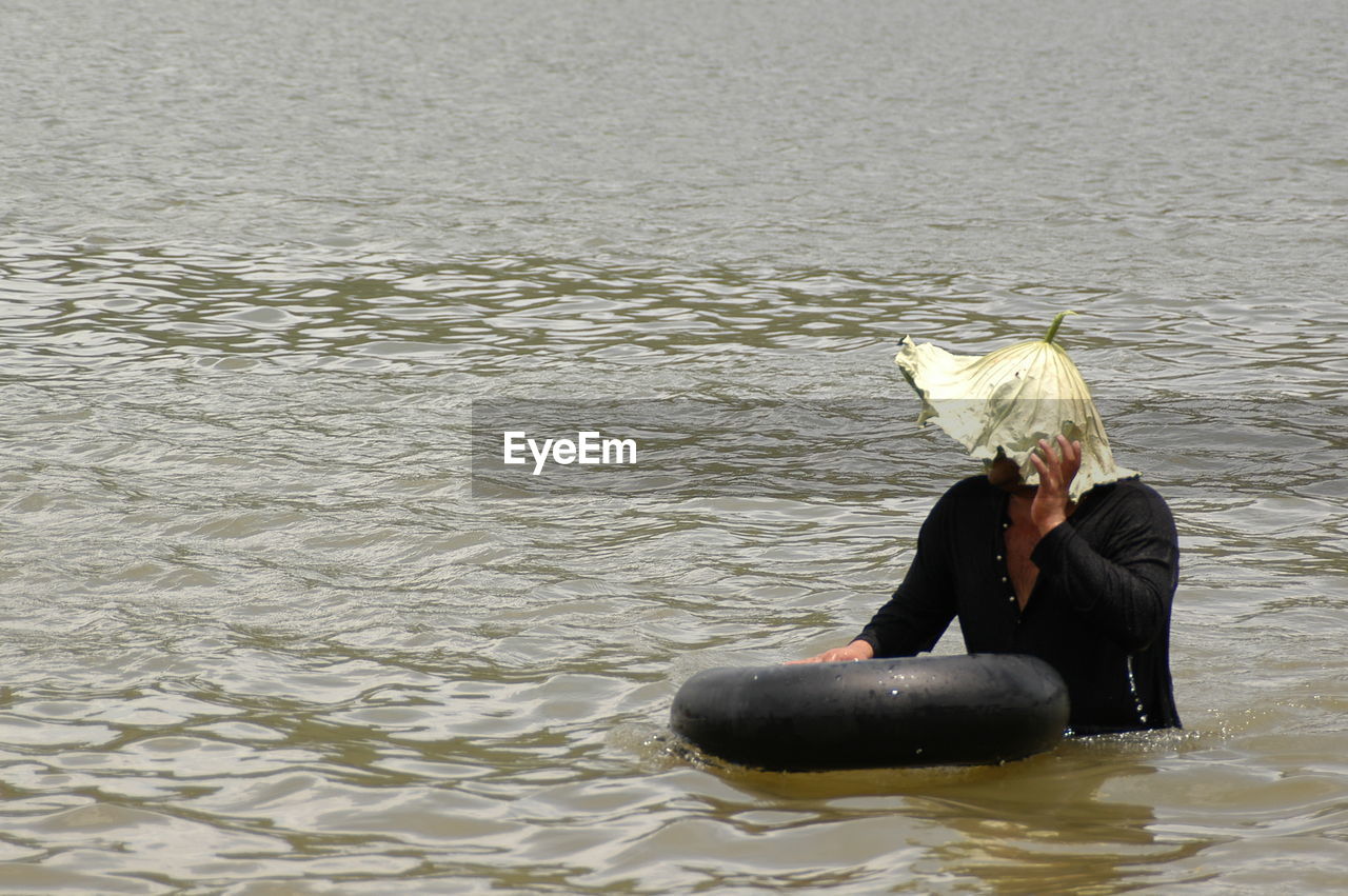 Man swimming in sea