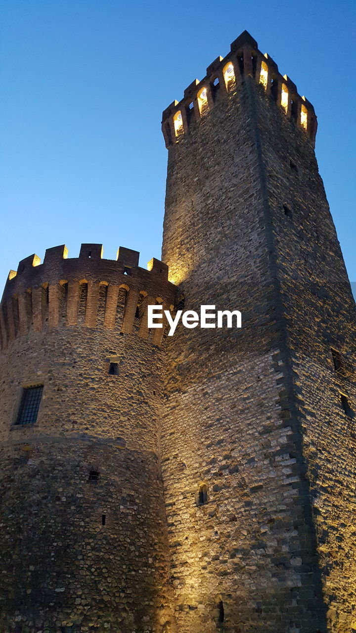 Low angle view of historic fort against sky