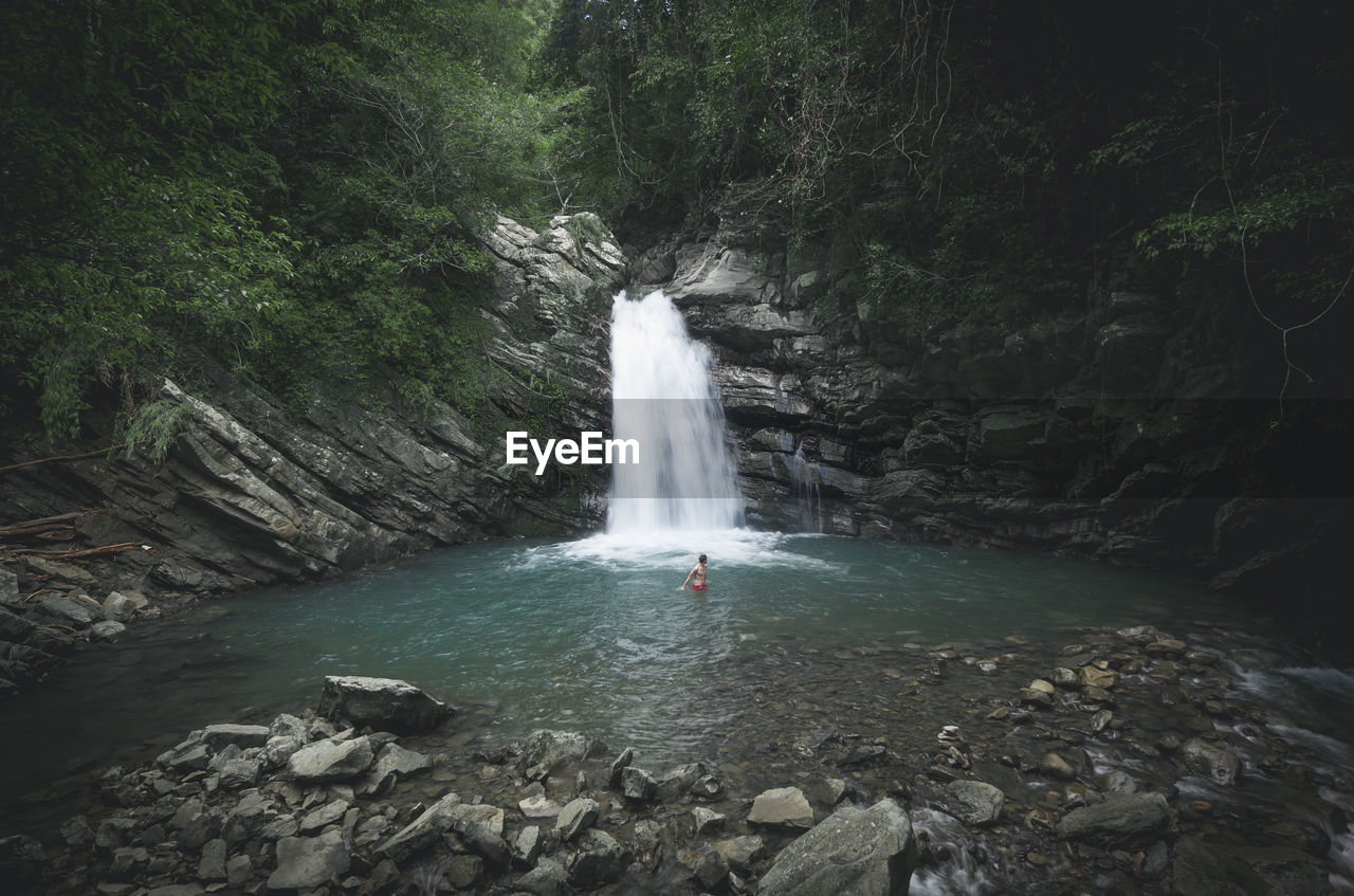 SCENIC VIEW OF WATERFALL