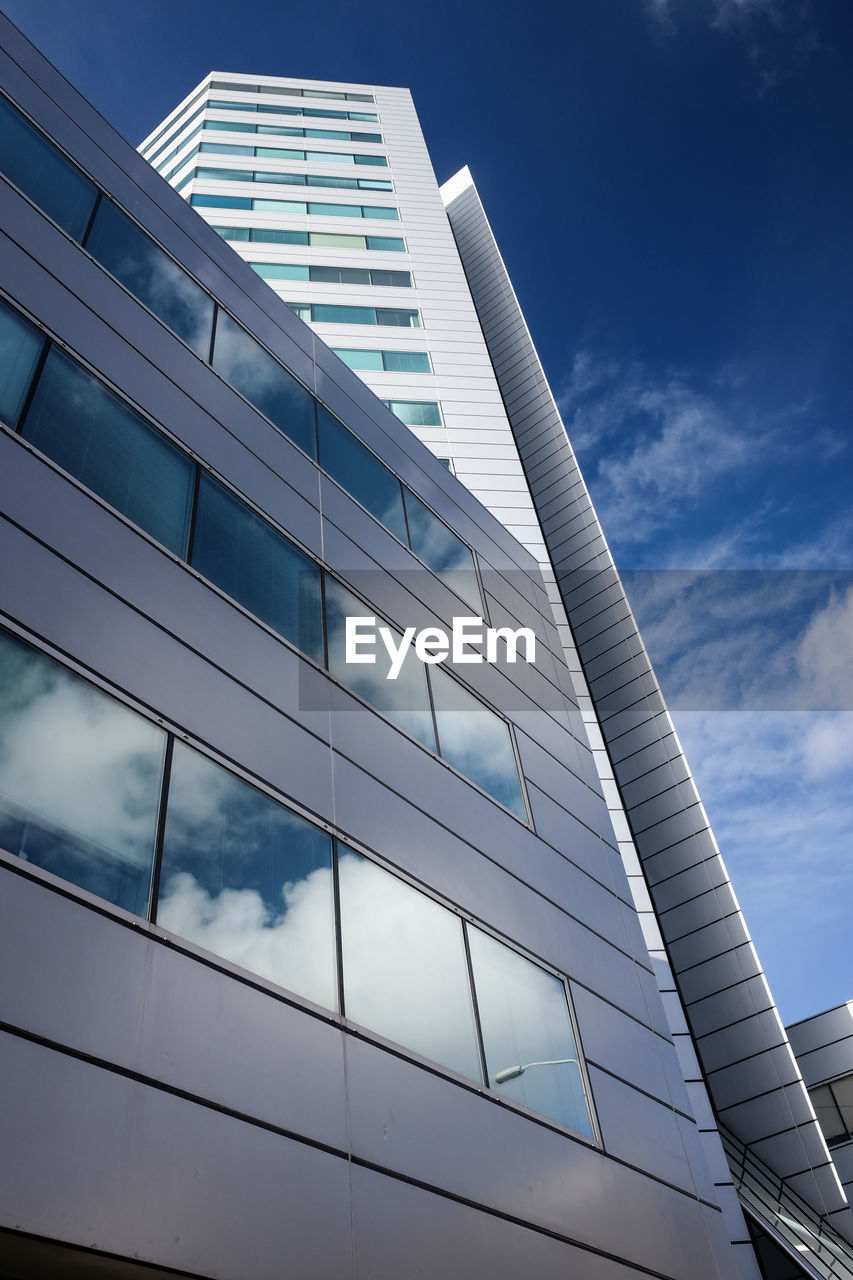 Low angle view of modern building against sky