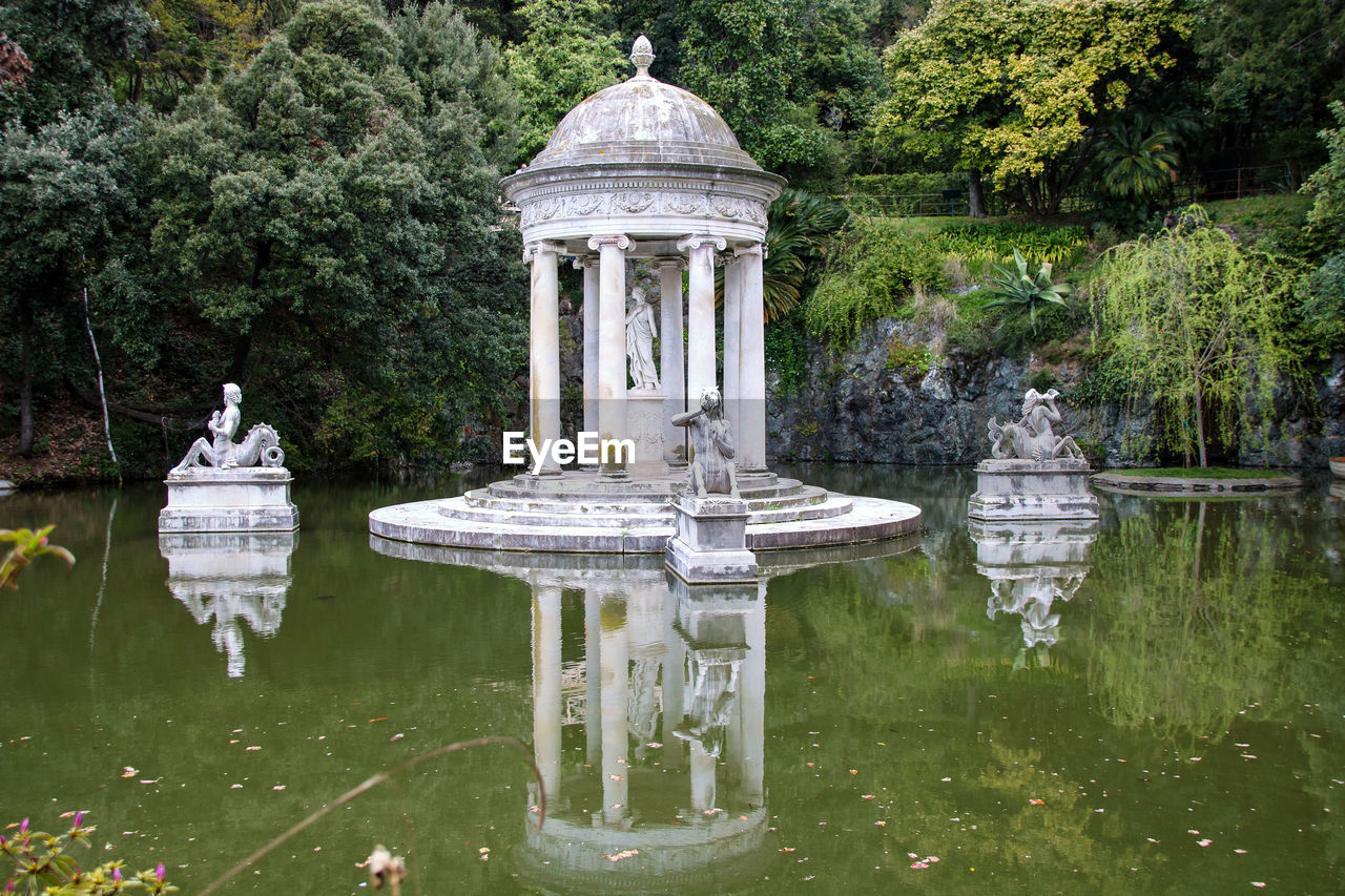 SCULPTURE IN PARK BY LAKE