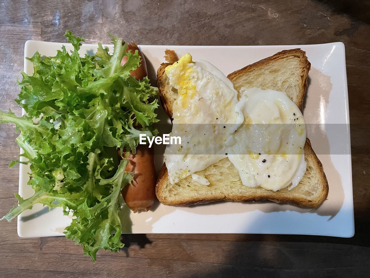 food and drink, food, healthy eating, freshness, wellbeing, fast food, vegetable, dish, indoors, high angle view, lunch, table, meal, bread, still life, no people, plate, produce, salad, wood, serving size, directly above, breakfast, herb, arugula, close-up, cutting board, cuisine