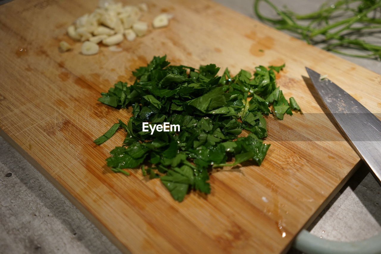 High angle view of chopped vegetables on cutting board