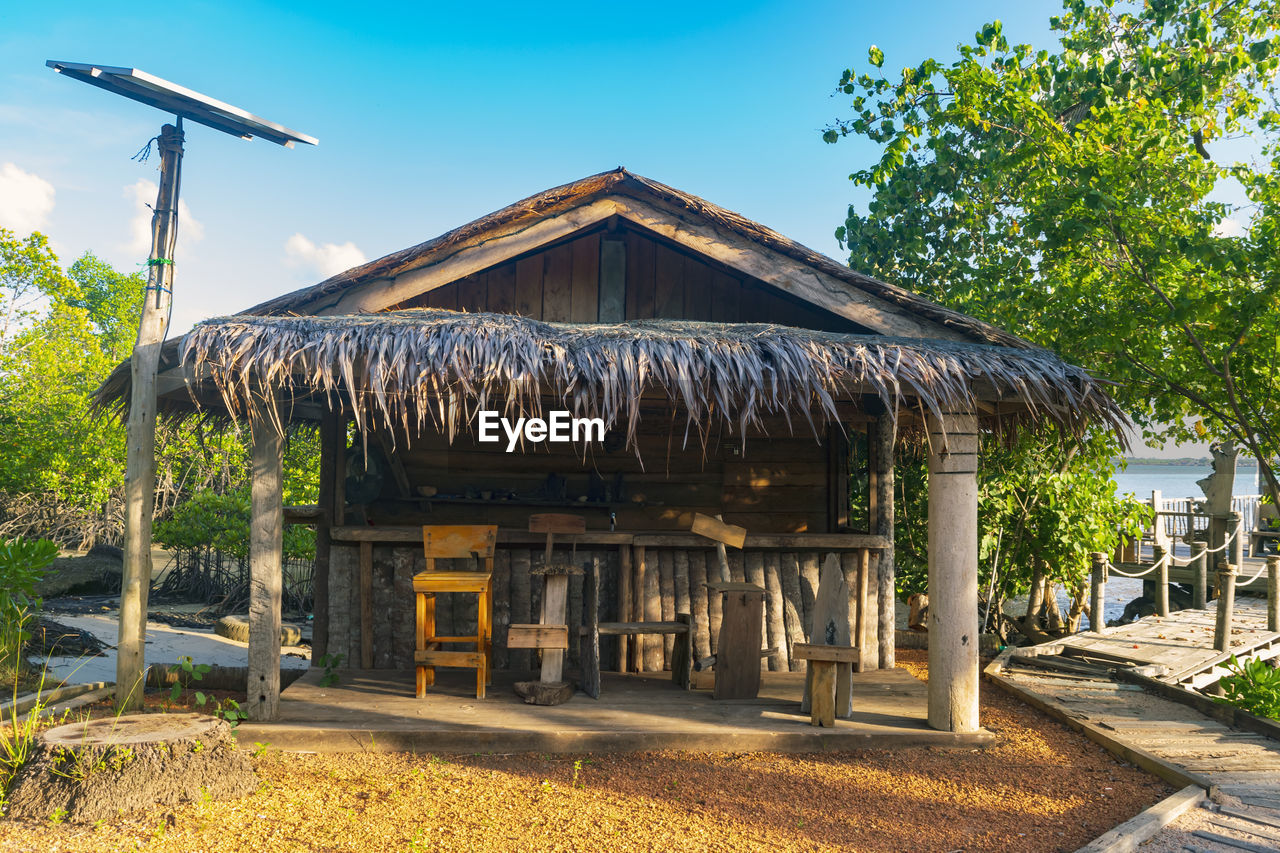 GAZEBO BY BUILDING AGAINST SKY