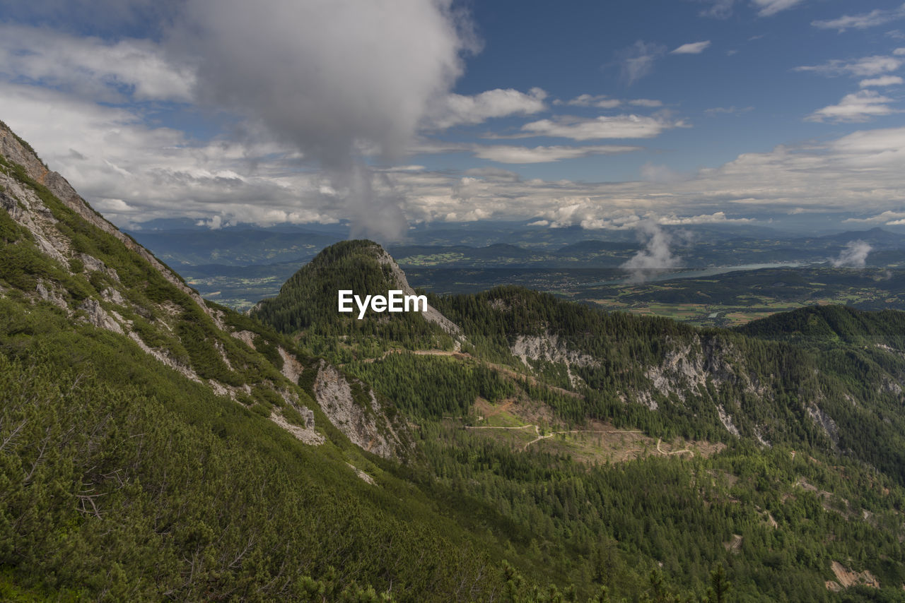 SCENIC VIEW OF VALLEY AGAINST SKY