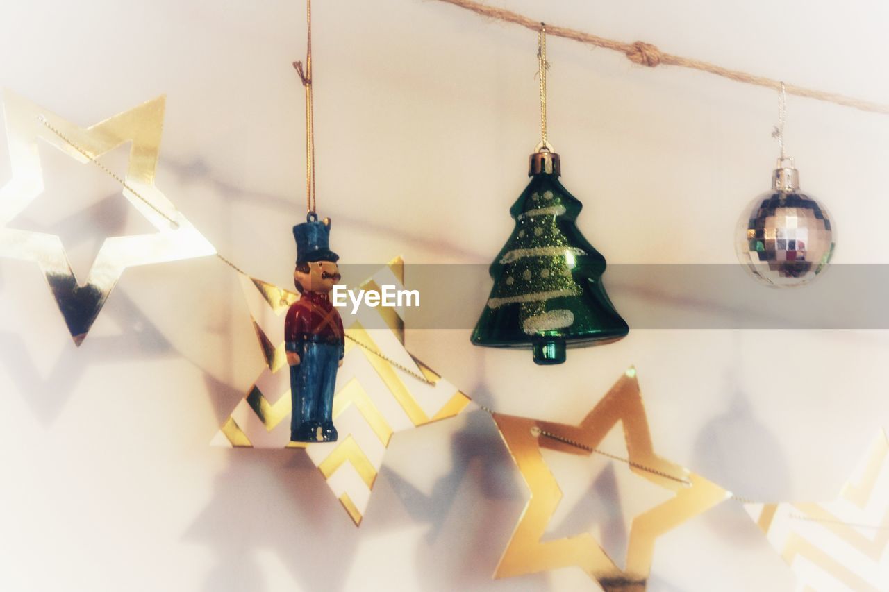 High angle view of christmas decorations hanging against wall