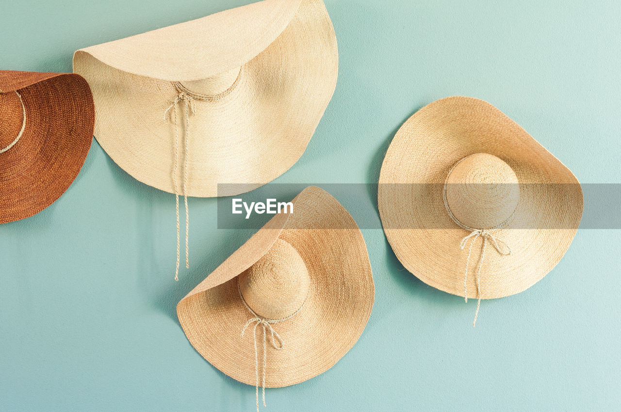 HIGH ANGLE VIEW OF UMBRELLAS ON TABLE