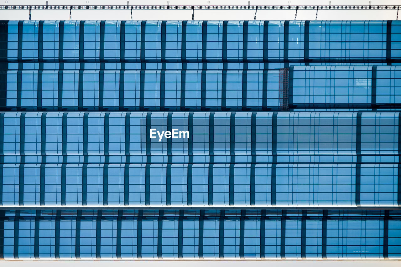 Full frame shot of swimming pool against building