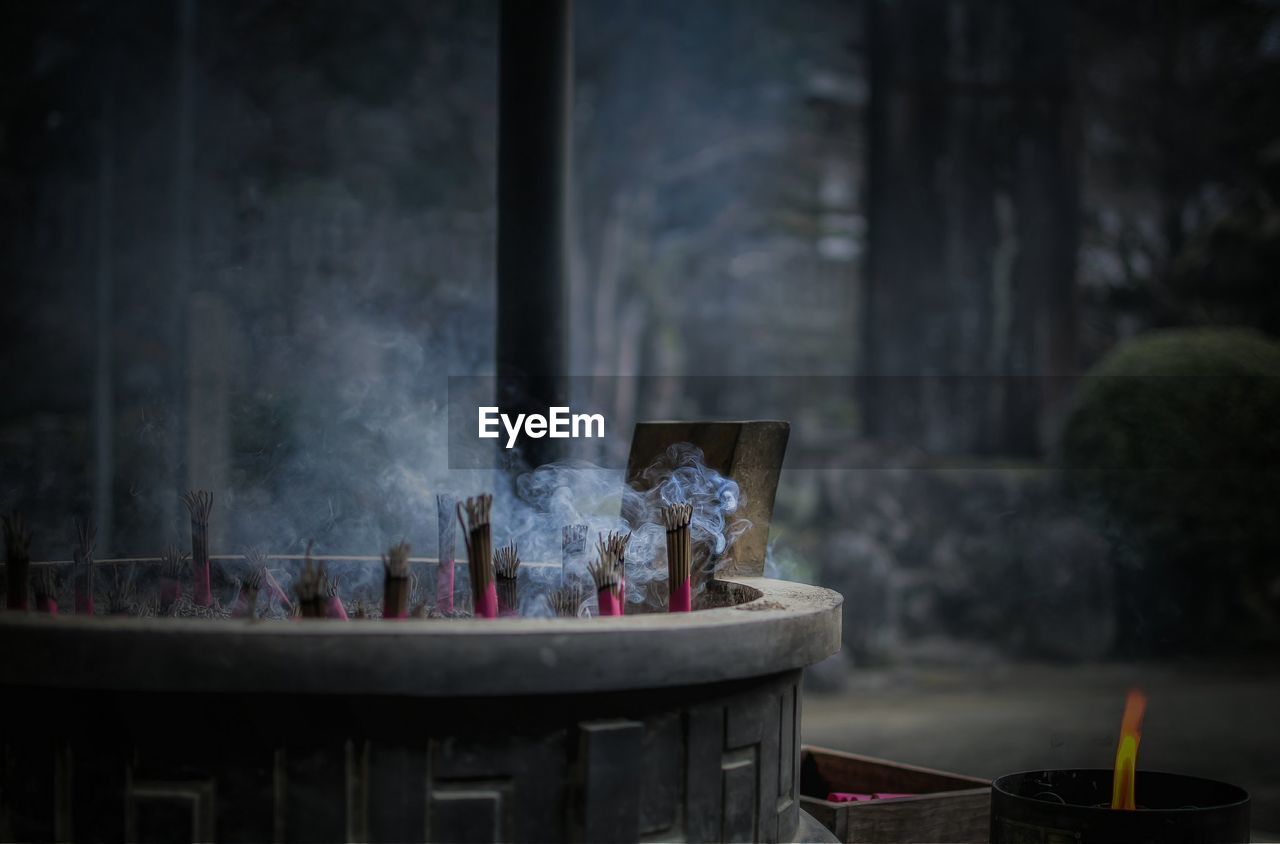 Incense sticks burning in shrine during hatsumode