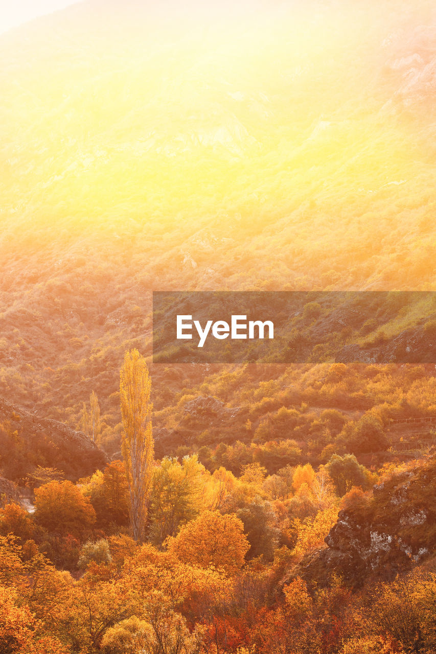 scenic view of mountains against sky during sunset