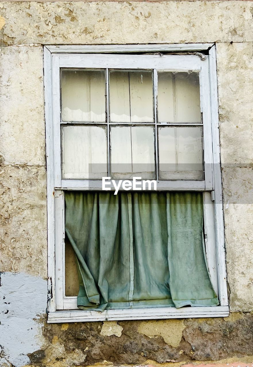 window, architecture, built structure, building exterior, wall, building, no people, day, wall - building feature, old, facade, house, outdoors, wood, closed, residential district, door, sash window, abandoned, glass, weathered, damaged, interior design, urban area