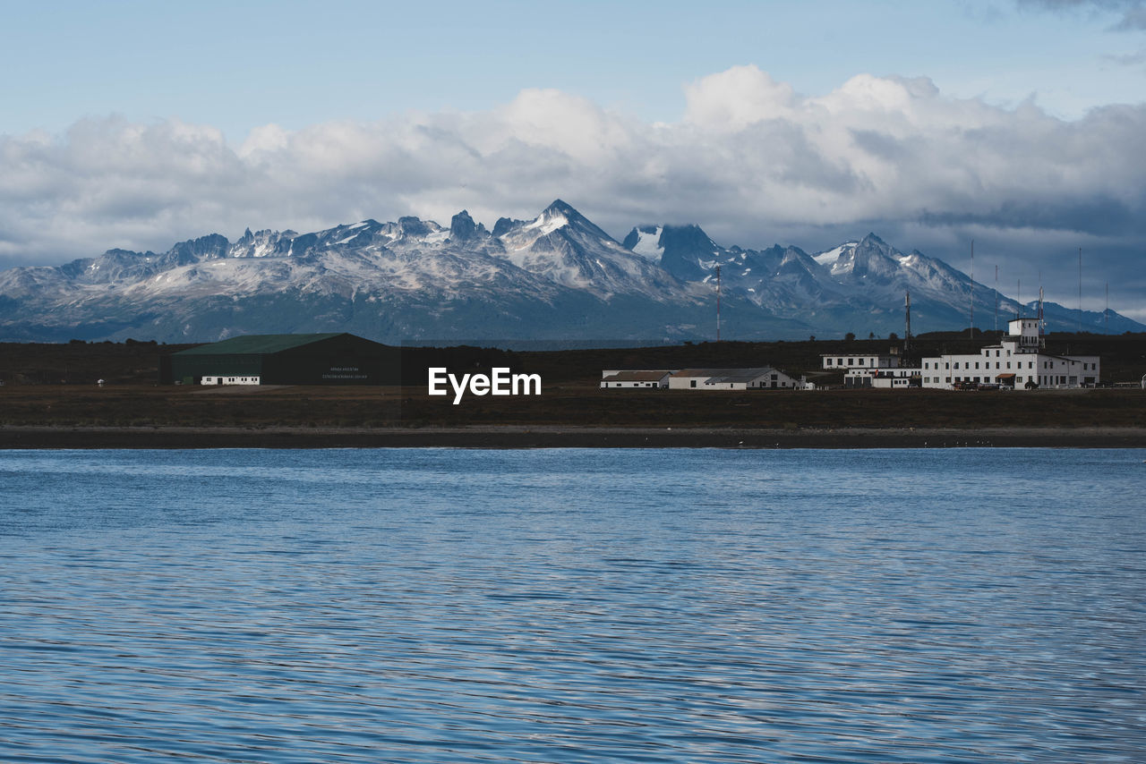 SCENIC VIEW OF SNOWCAPPED MOUNTAIN AGAINST SKY DURING WINTER