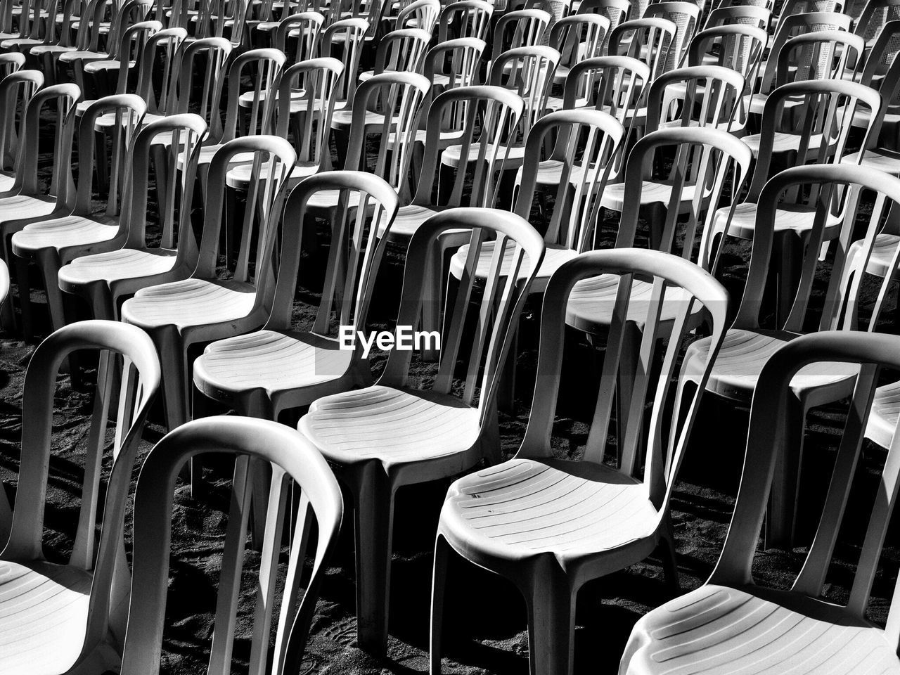 EMPTY CHAIRS IN ROW