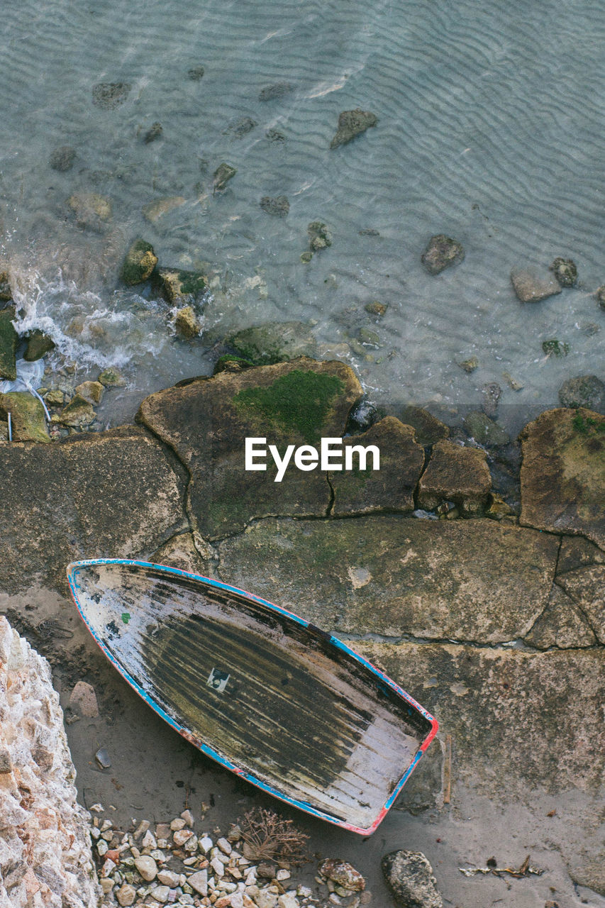 High angle view of boat moored at seaside