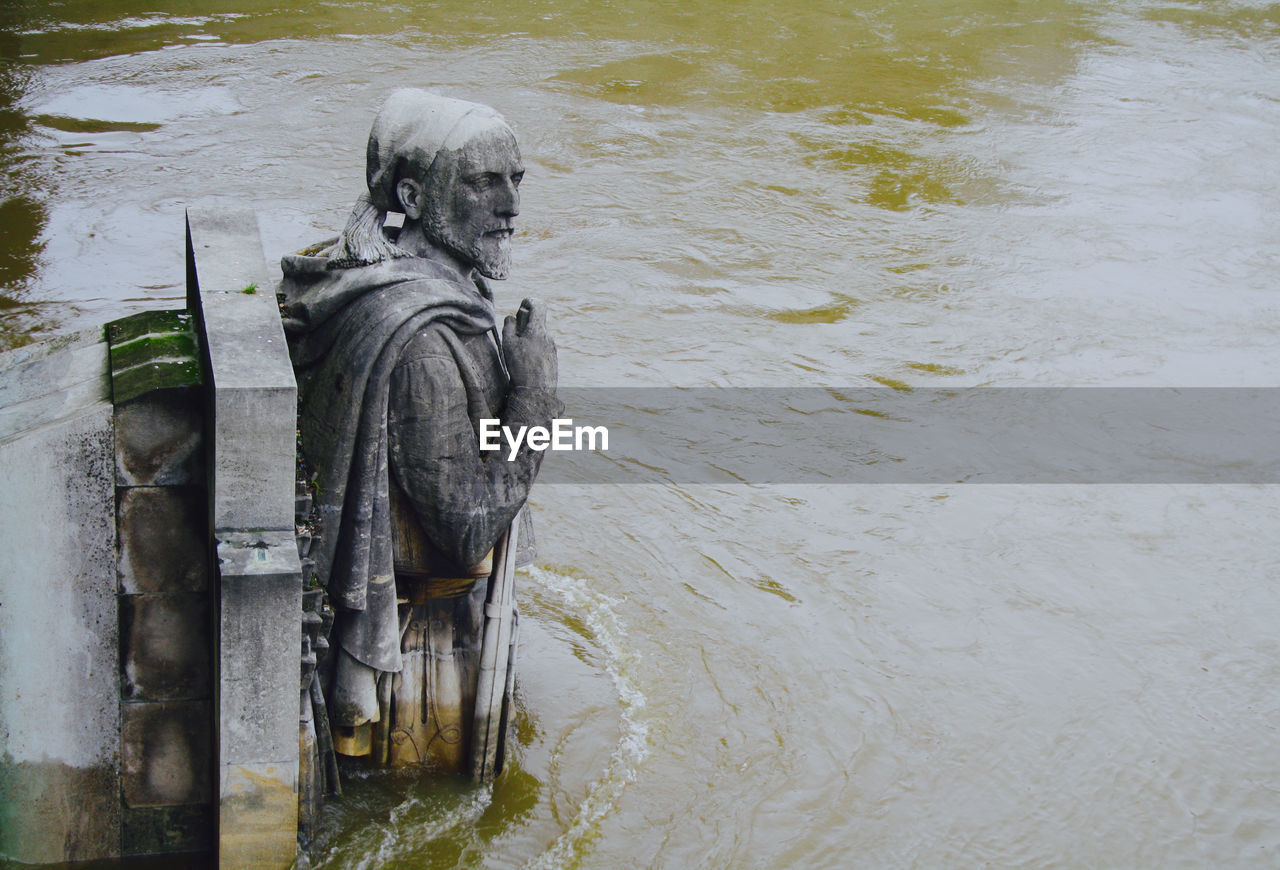 High angle view of statue in river