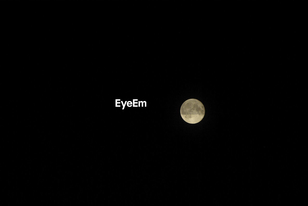 Low angle view of moon in sky