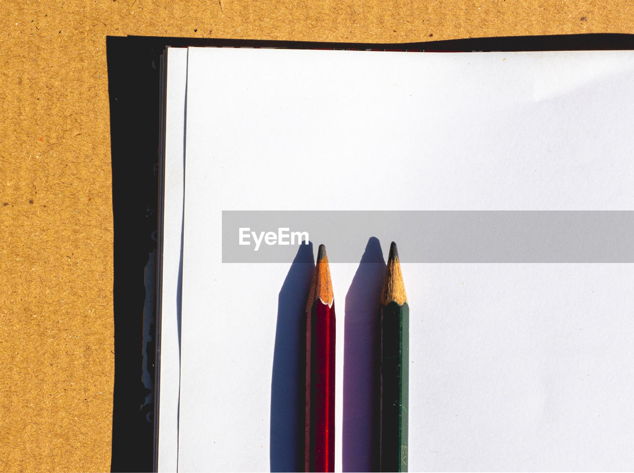 Close-up of colored pencils on table