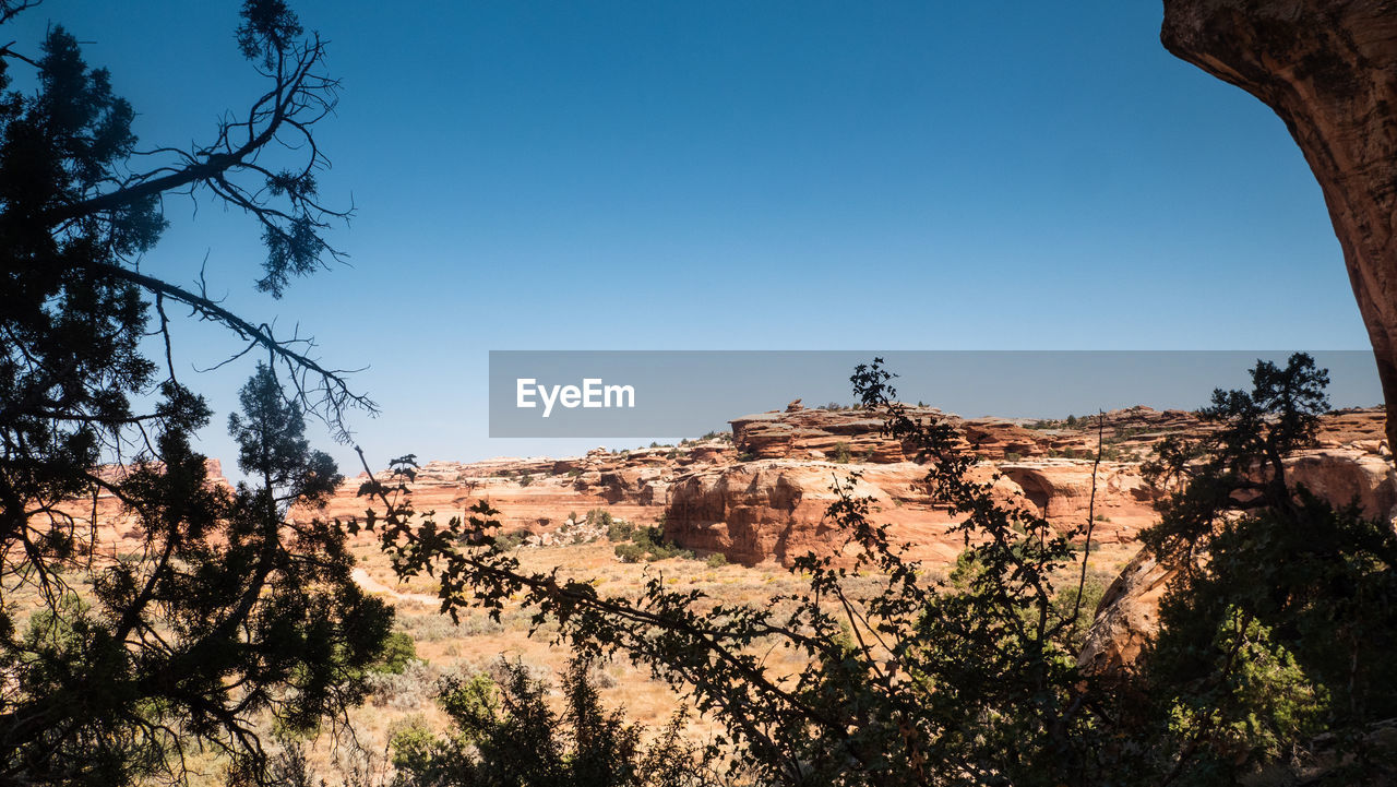 SCENIC VIEW OF LAND AGAINST CLEAR SKY