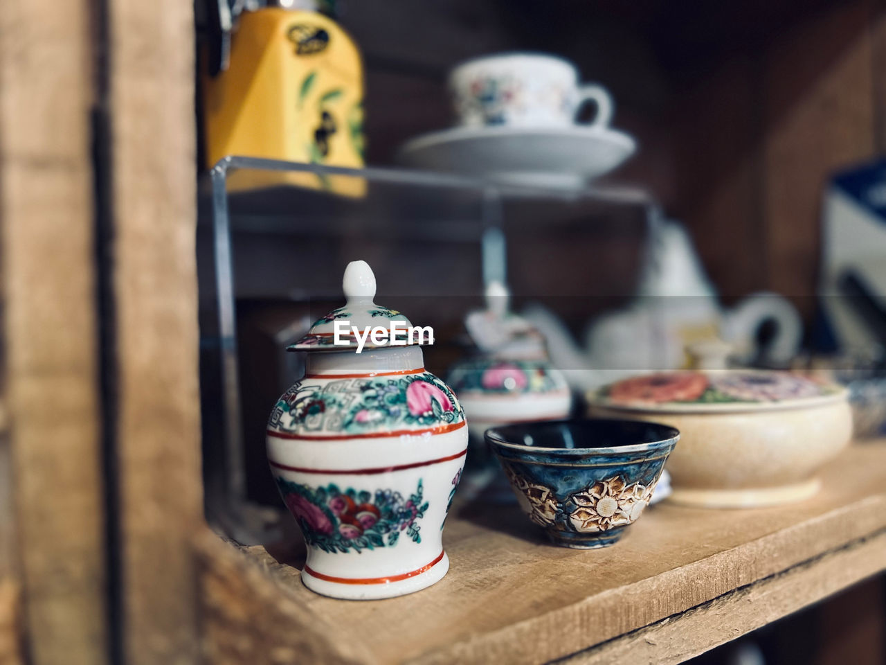 ceramic, blue, teapot, food and drink, porcelain, no people, tea cup, cup, craft, tea, mug, tableware, crockery, hot drink, focus on foreground, blue and white porcelain, food, indoors, pottery, art, container, wood, tradition, table, bowl, drink, still life, selective focus, household equipment