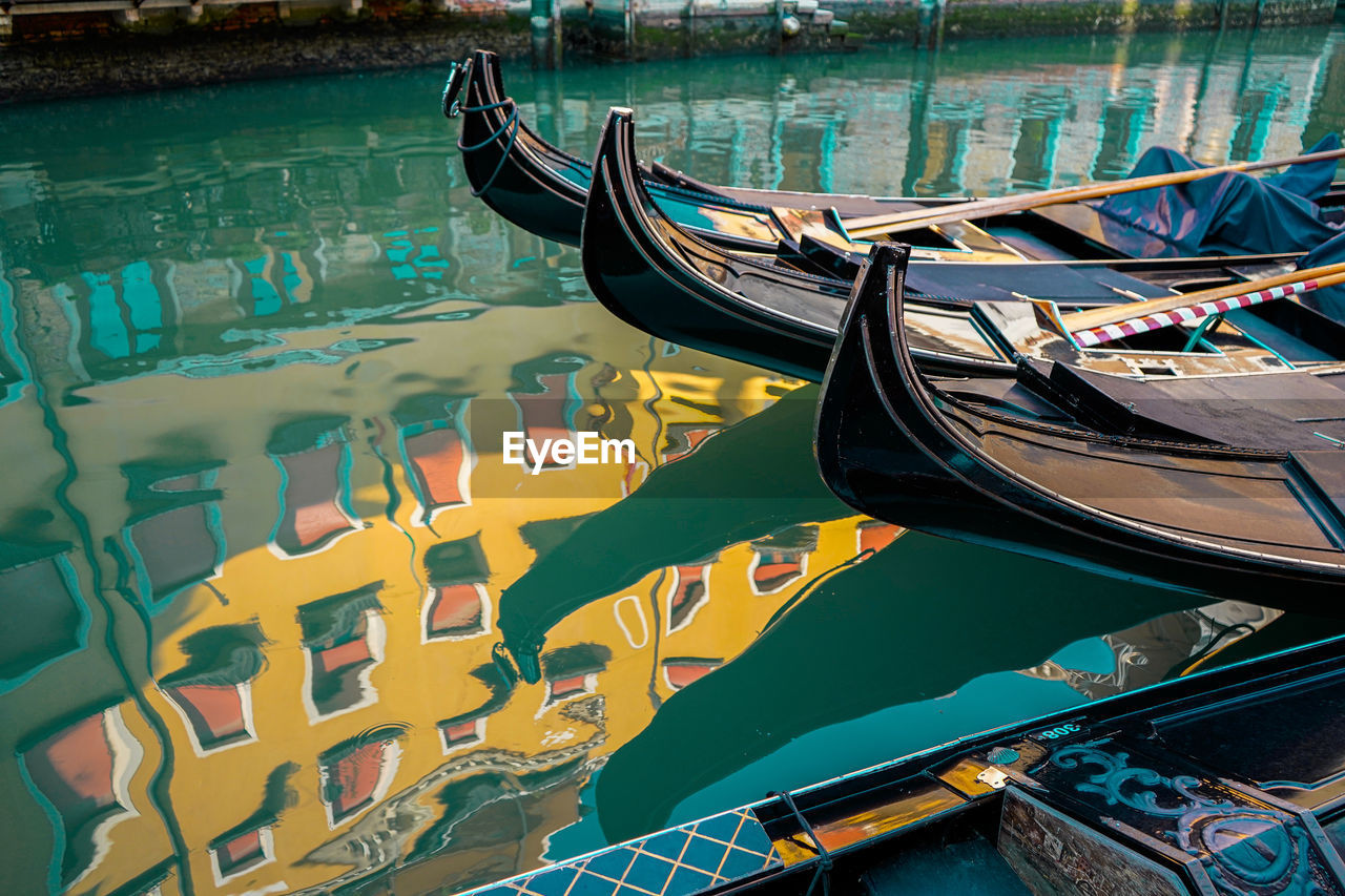 High angle view of boats moored at canal