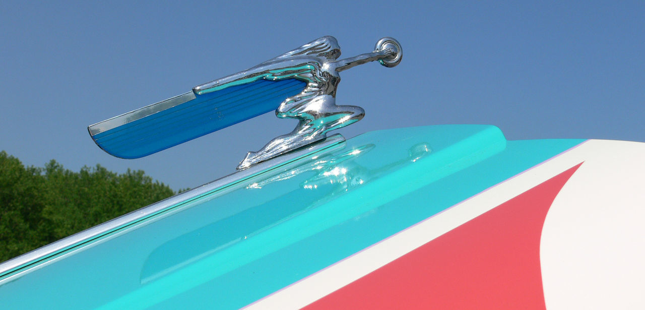 CLOSE-UP OF FAUCET IN WATER AGAINST BLUE SKY