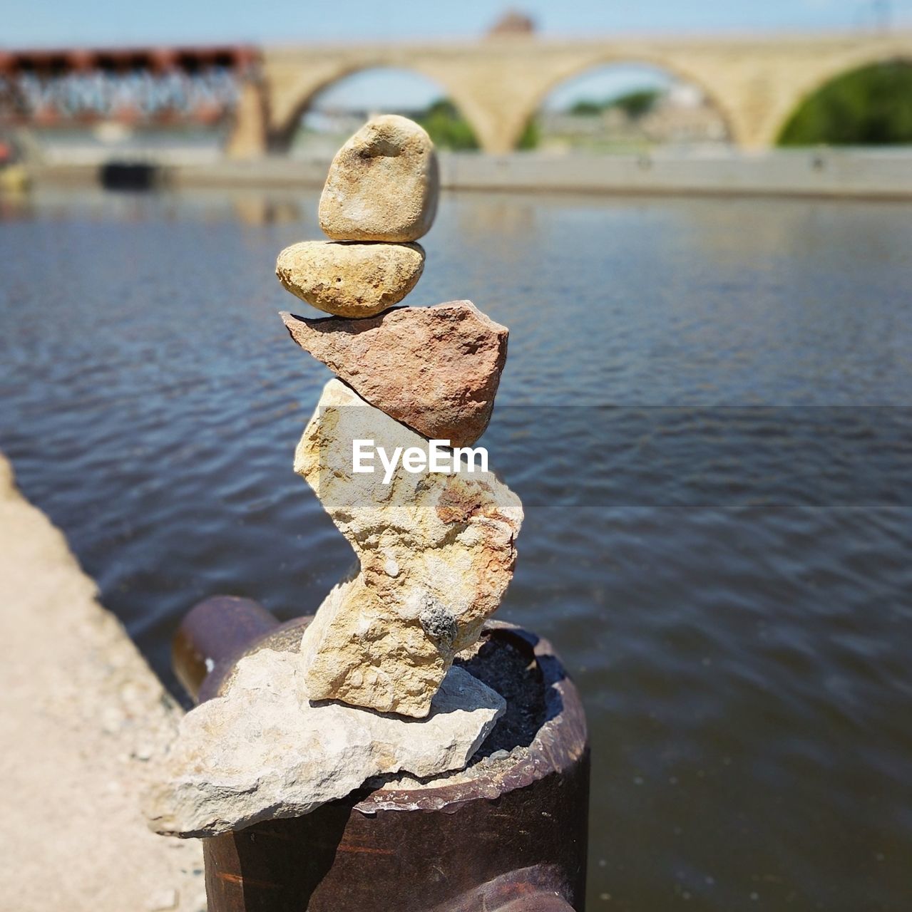 CLOSE-UP OF WATER ON RIVERBANK