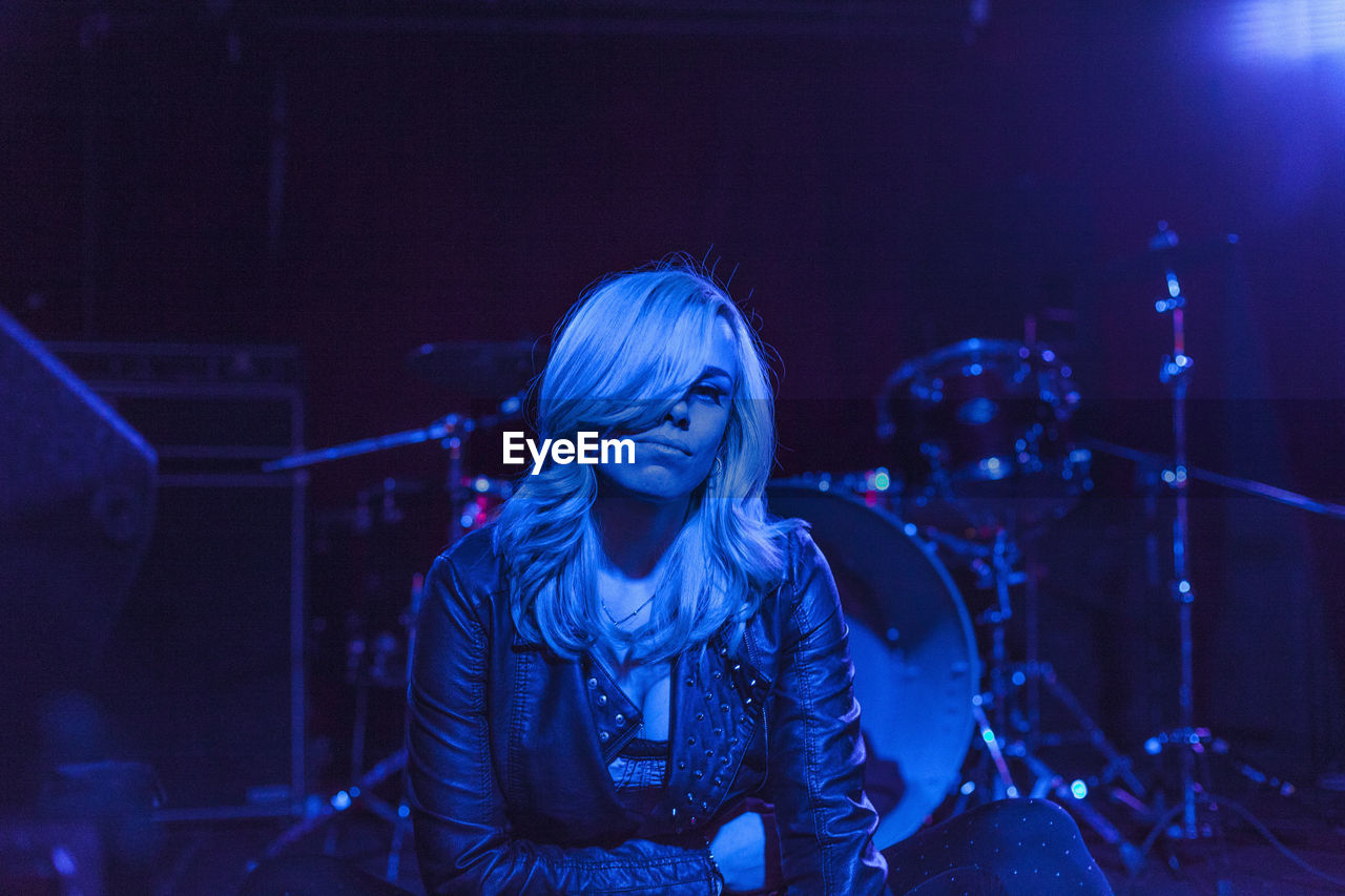 Portrait of a beautiful young woman at a nightclub