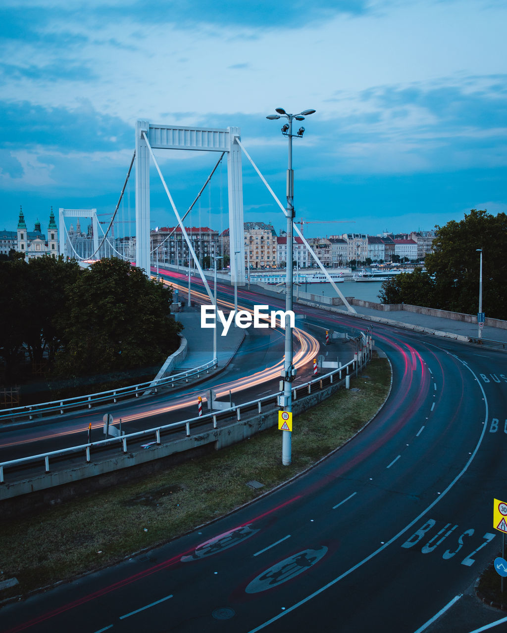 High angle view of light trails on road in city