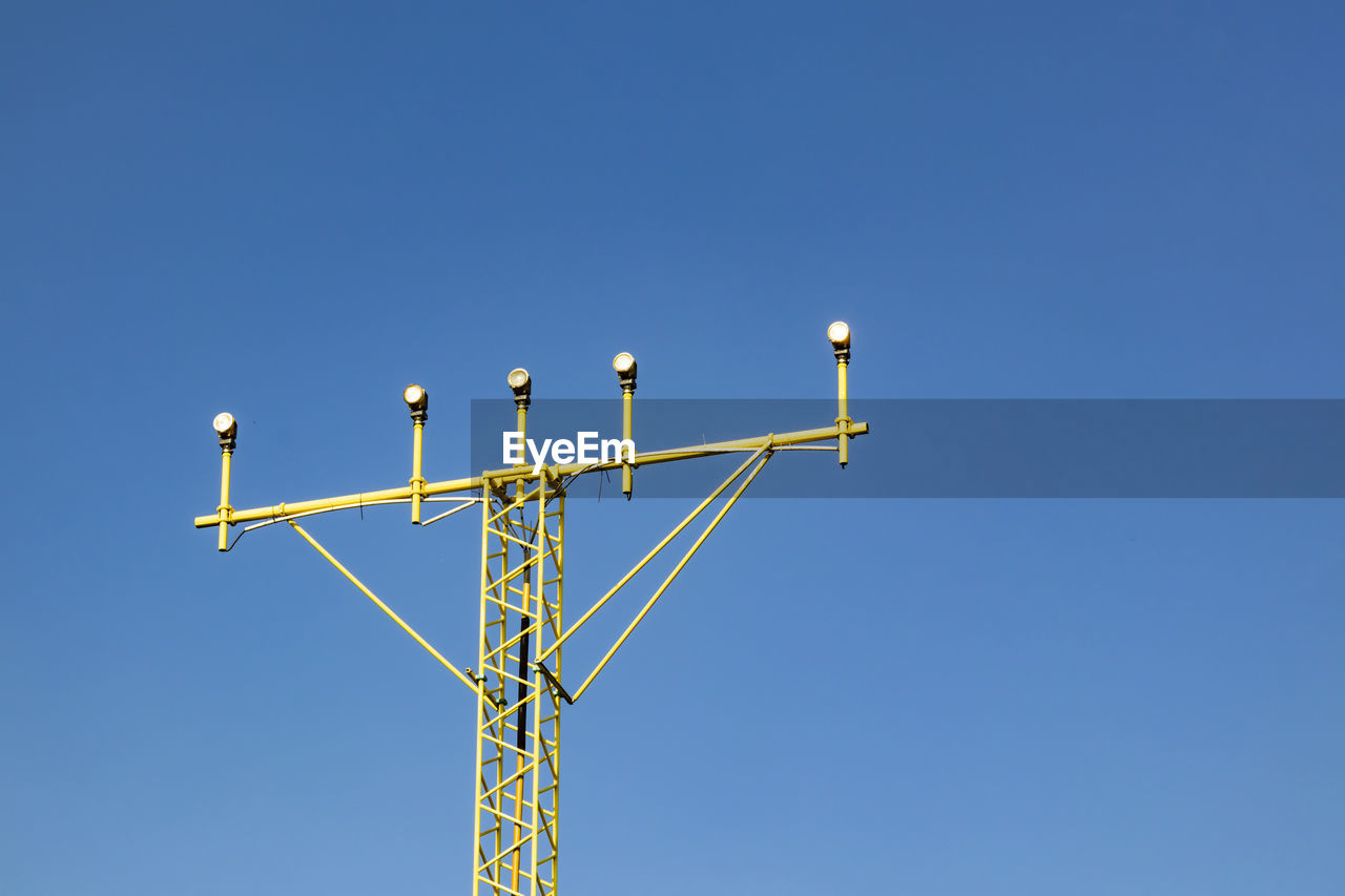 Low angle view of street light against clear sky