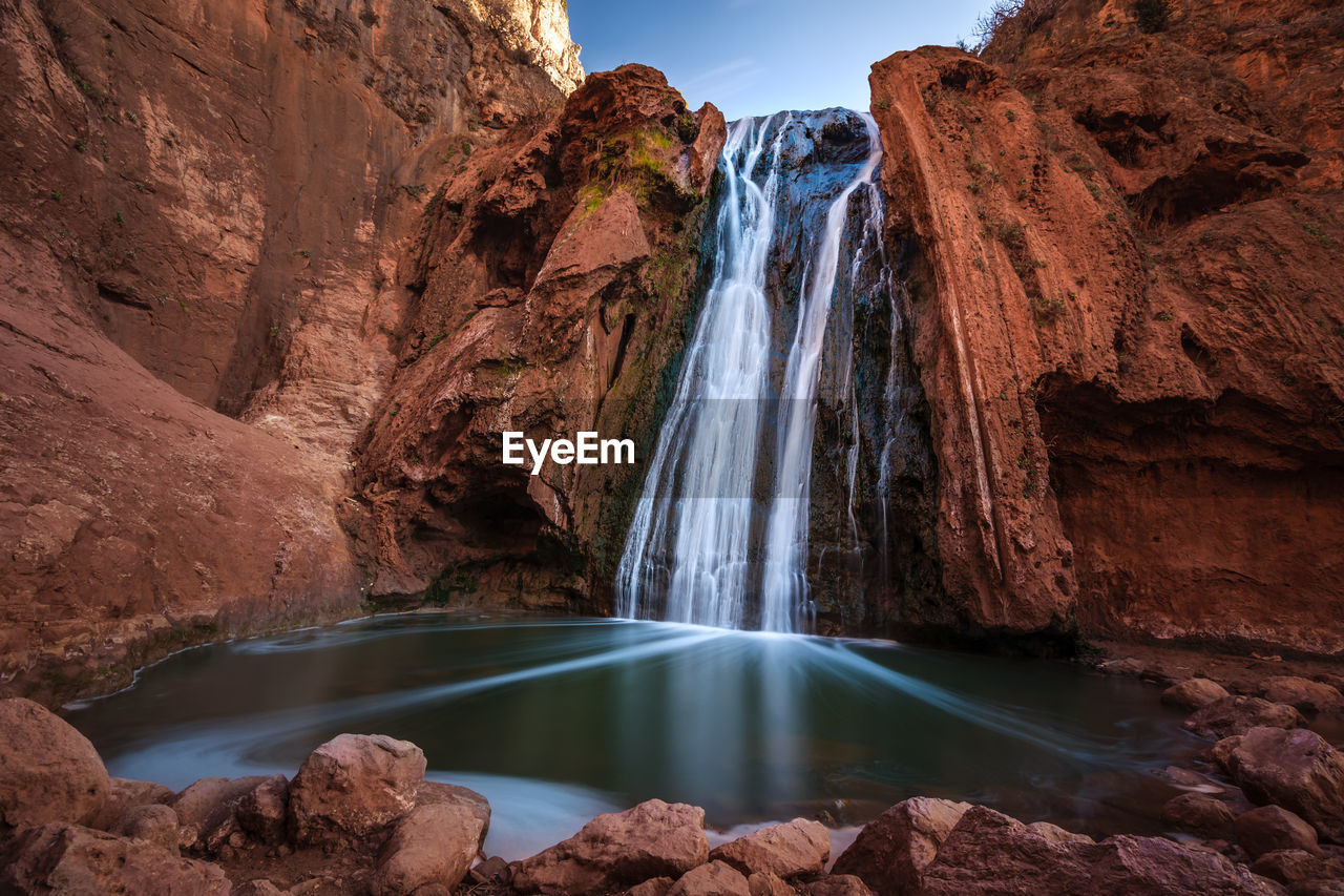 Low angle view of waterfall