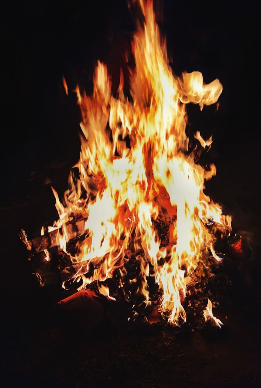 CLOSE-UP OF BONFIRE IN NIGHT