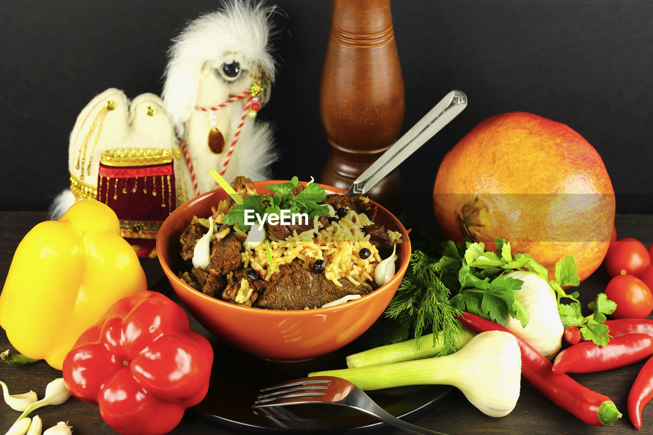 Close-up of food in bowl amidst vegetables