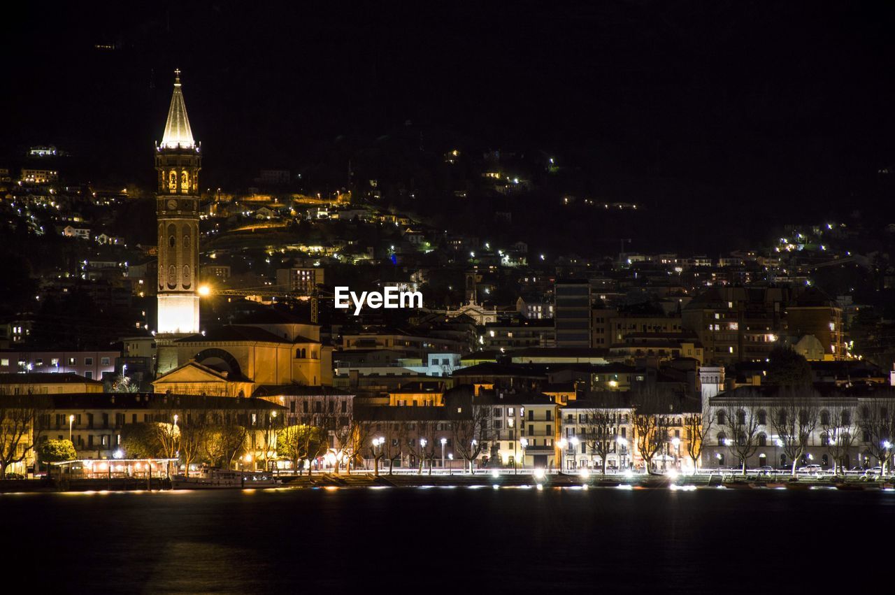 Illuminated buildings in city at night